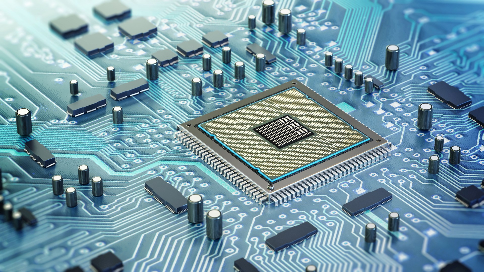 Intricate design of a computer chip on a circuit board surrounded by electronic components